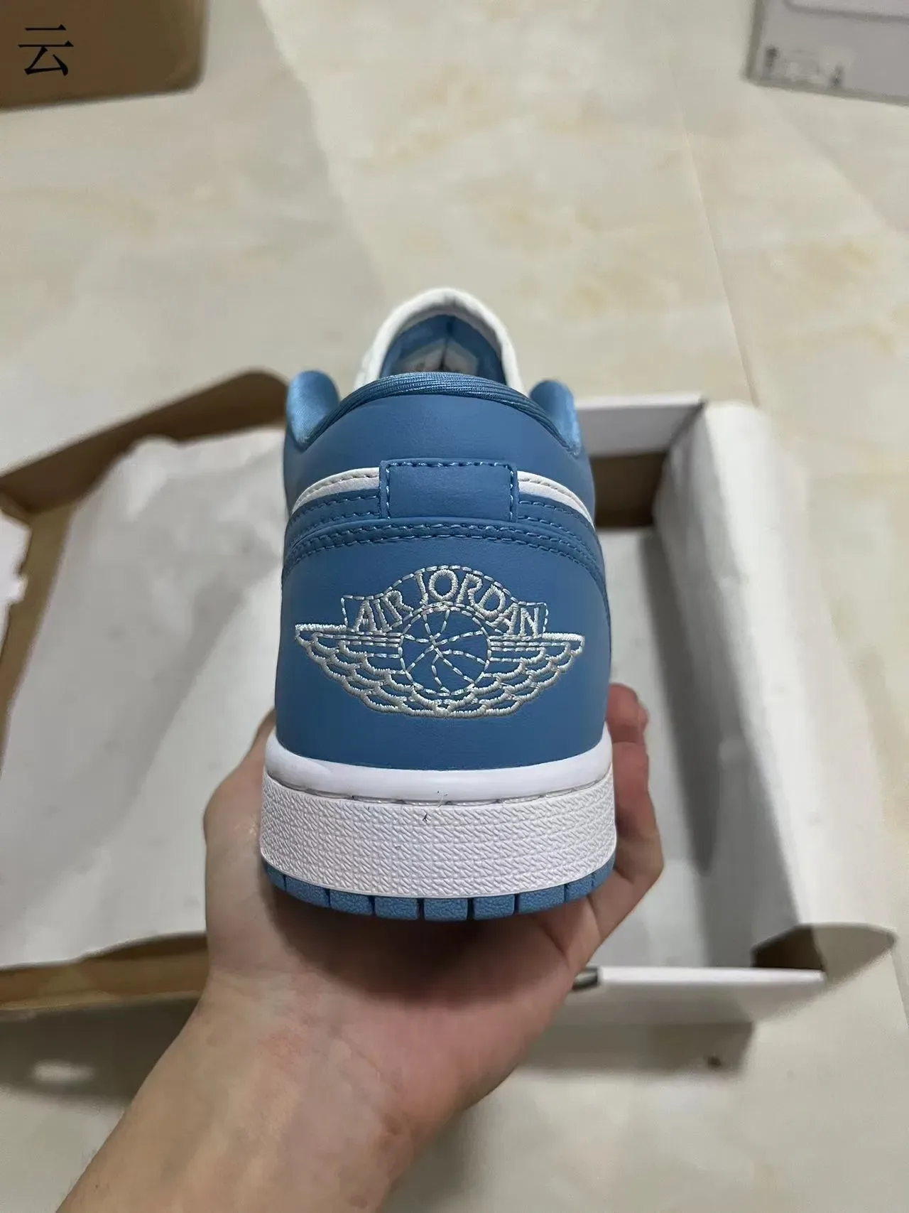 Nike Air Jordan 1 Low University Blue White tênis lifestyle 6
