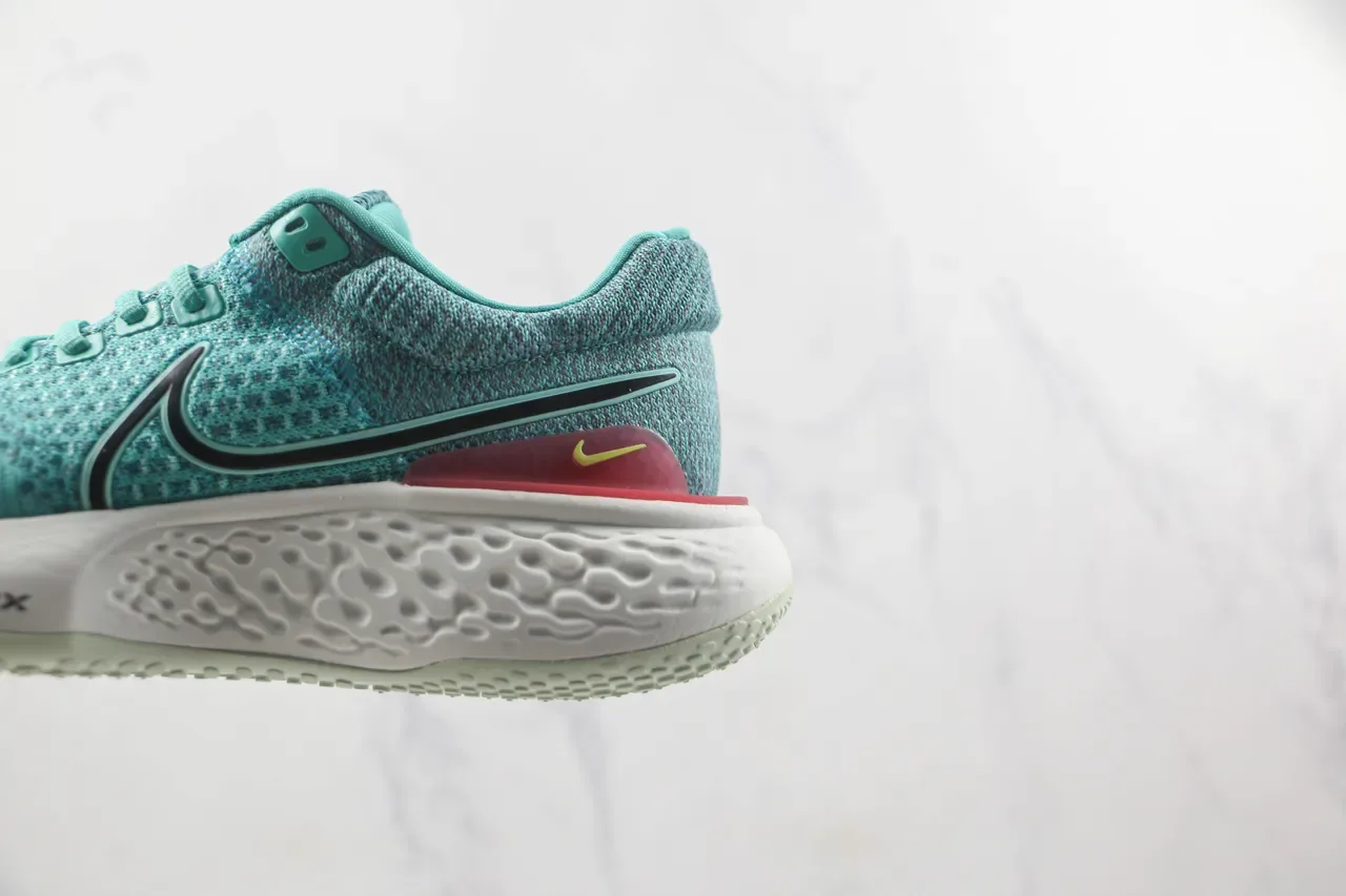 Nike Chaussures de running bleu et rose upper knit ZoomX midsole 7
