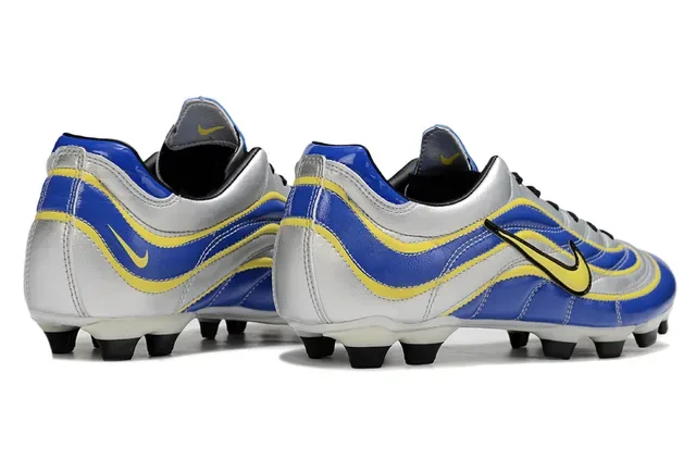 Nike Chaussures de football bleu argent low-cut upper synthétique superpositions motif ondulé terrain ferme 4