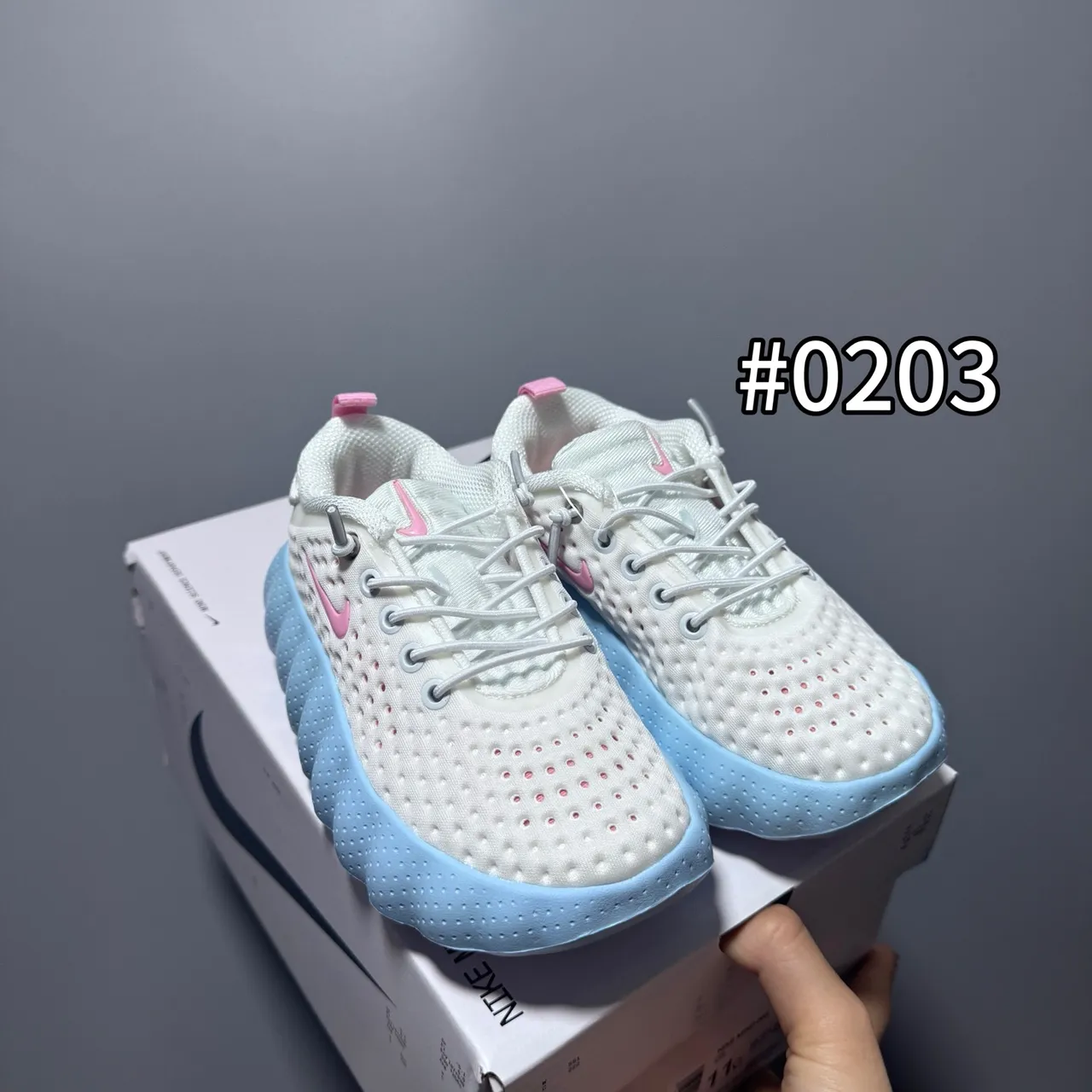 Nike Gray White Perforated Knit Upper Sculpted Wavy Midsole Running Shoes 7