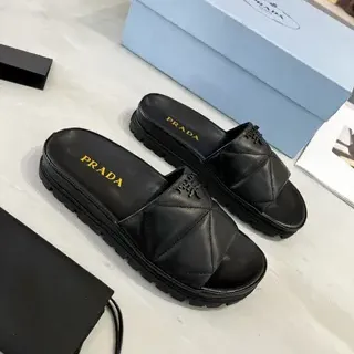 Prada Cloudbust أحذية منزلية جلد أسود مبطن منصة