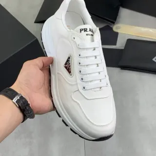 Prada White Black Leather Upper Triangular Metal Logo Lifestyle Sneakers
