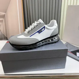 Prada أبيض رمادي منخفض الارتفاع طبقي اصطناعي علوي أسلوب حياة أحذية رياضية