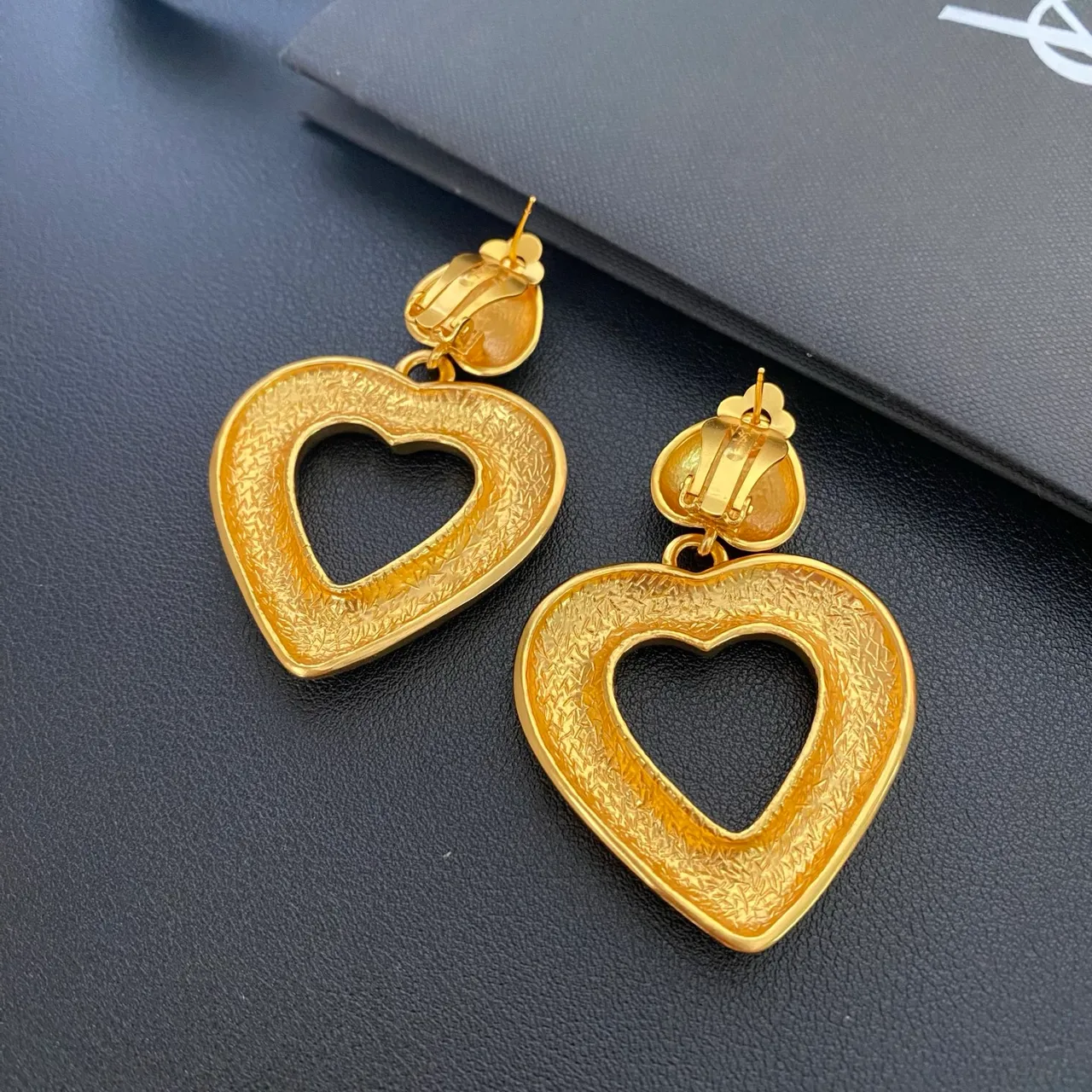 Saint Laurent Hammered Gold Engraved Heart Earrings 2