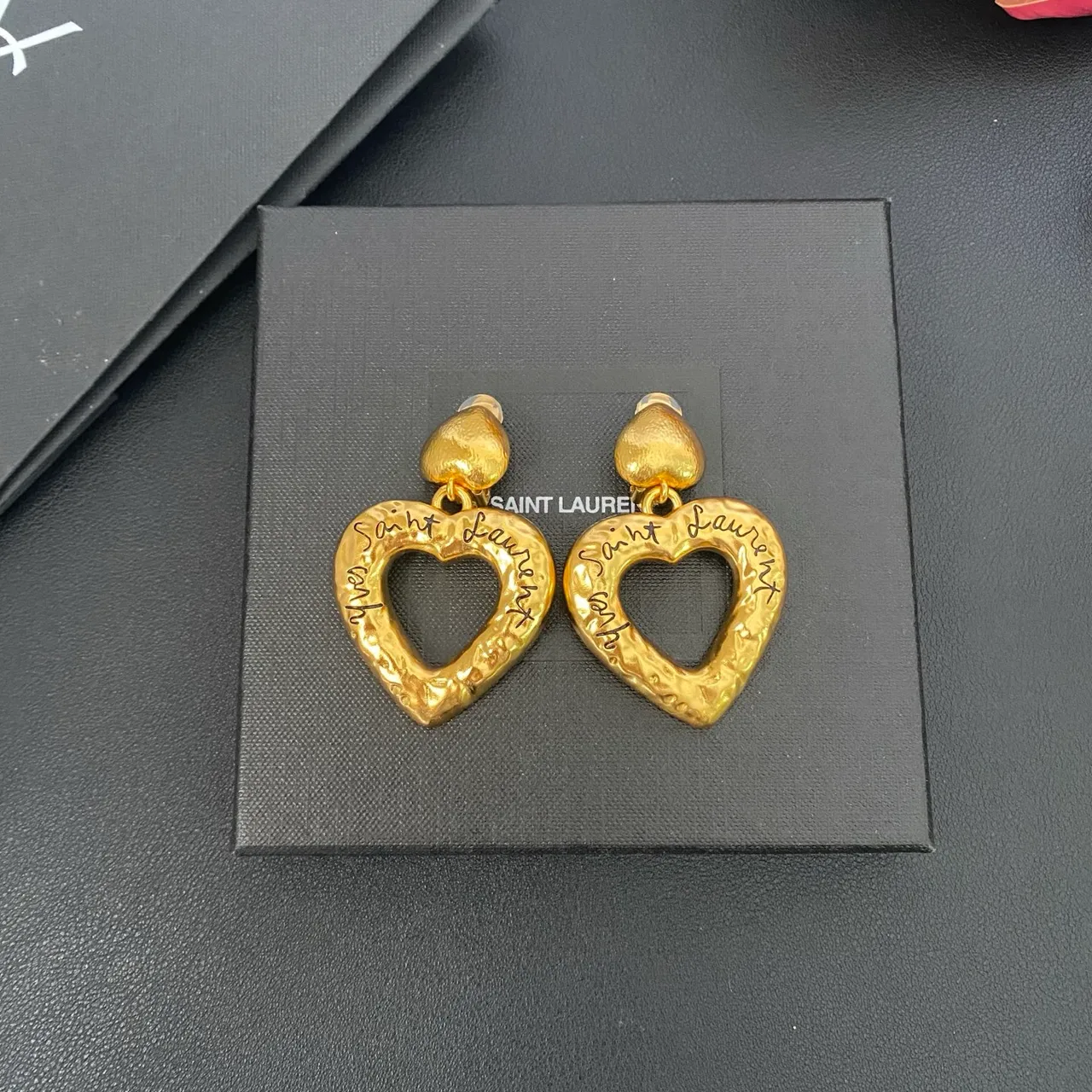 Saint Laurent Hammered Gold Engraved Heart Earrings 4
