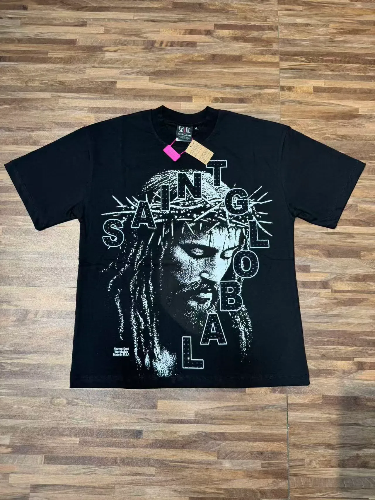 Saint Laurent Saint ग्राफिक प्रिंट काली टी-शर्ट 11