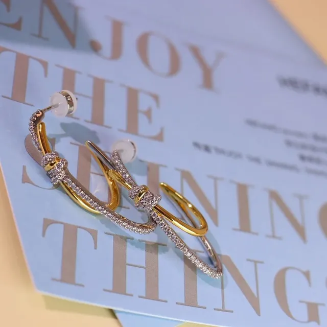 Tiffany & Co. Boucles d'oreilles nœud Pavé ton or 5