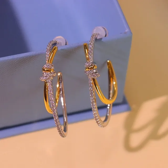 Tiffany & Co. Boucles d'oreilles nœud Pavé ton or 6