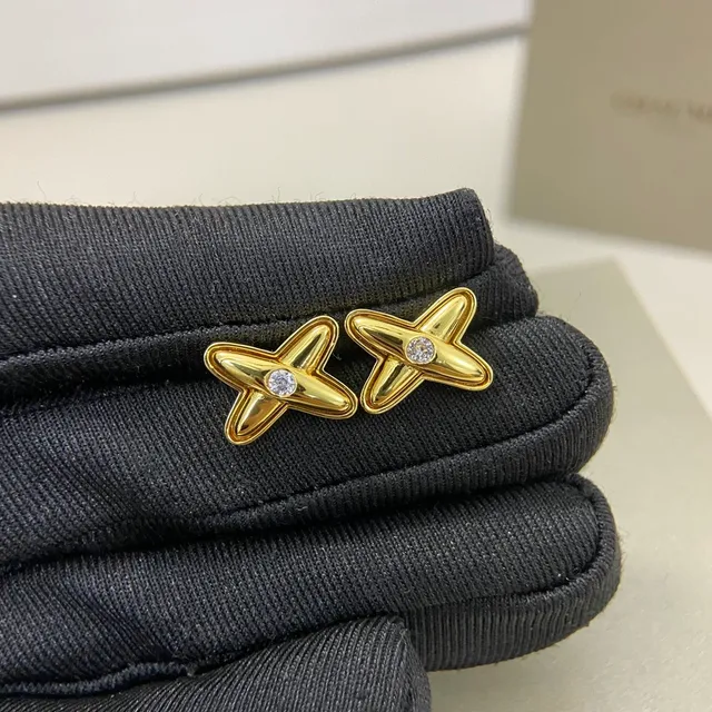 Tiffany & Co. Aretes de oro y plata con forma de X 2