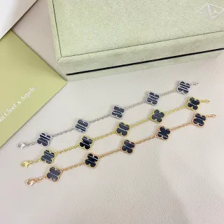 Van Cleef & Arpels Alhambra Bracelet en Or Noir avec Charms Trèfle à Quatre Feuilles Émaillé Rayé
