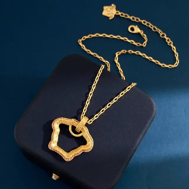 Versace Greca Odissea Gold-Tone Cloud Pendant Necklaces 5
