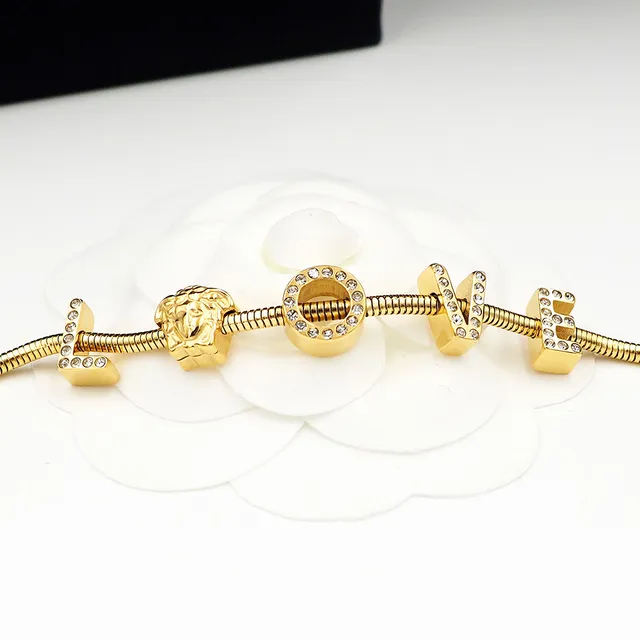 Versace Love Medusa سلسلة الثعبان بلون ذهبي سوار 7
