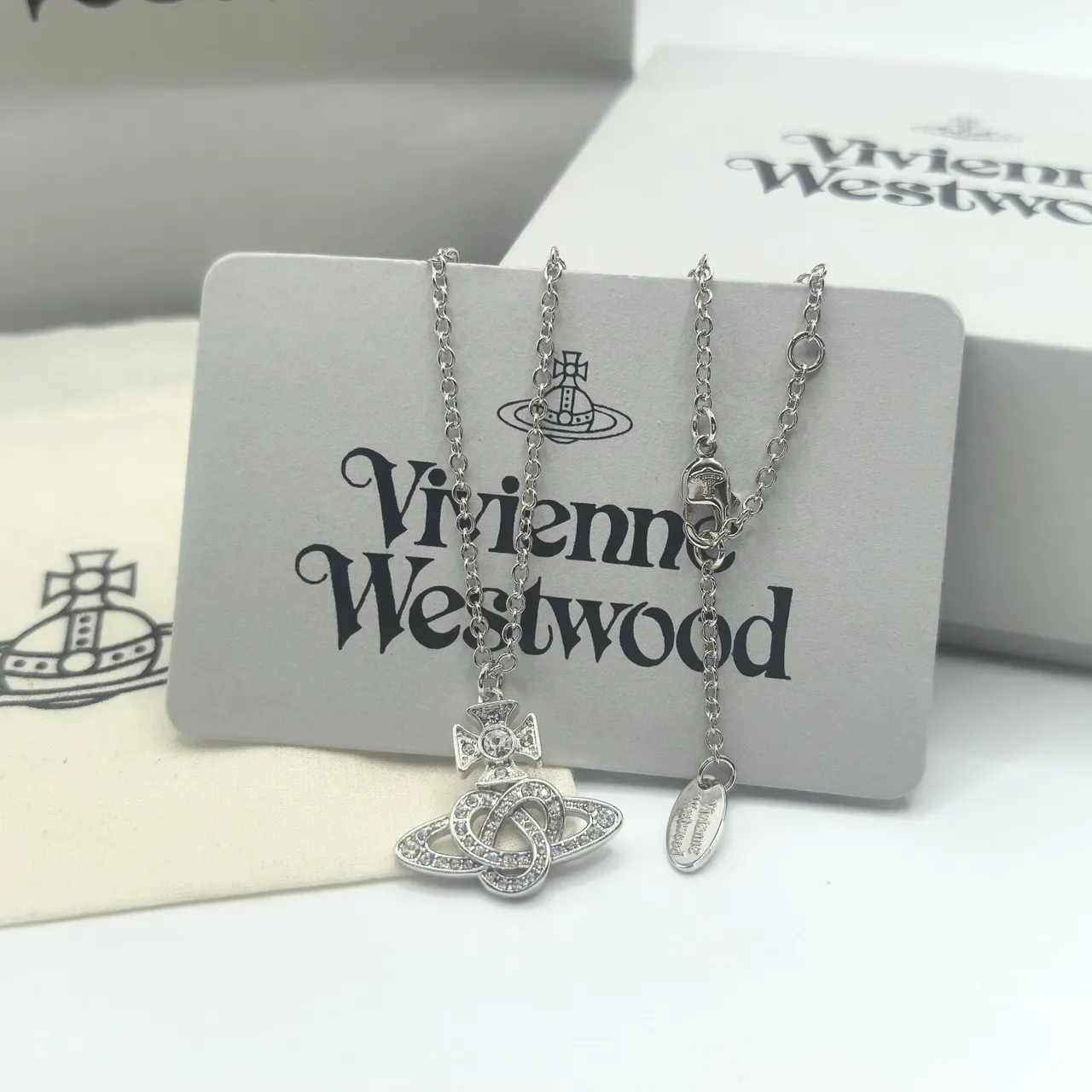 Vivienne Westwood Orb Pendant Necklace Gold and Silver Crystal Necklaces 2
