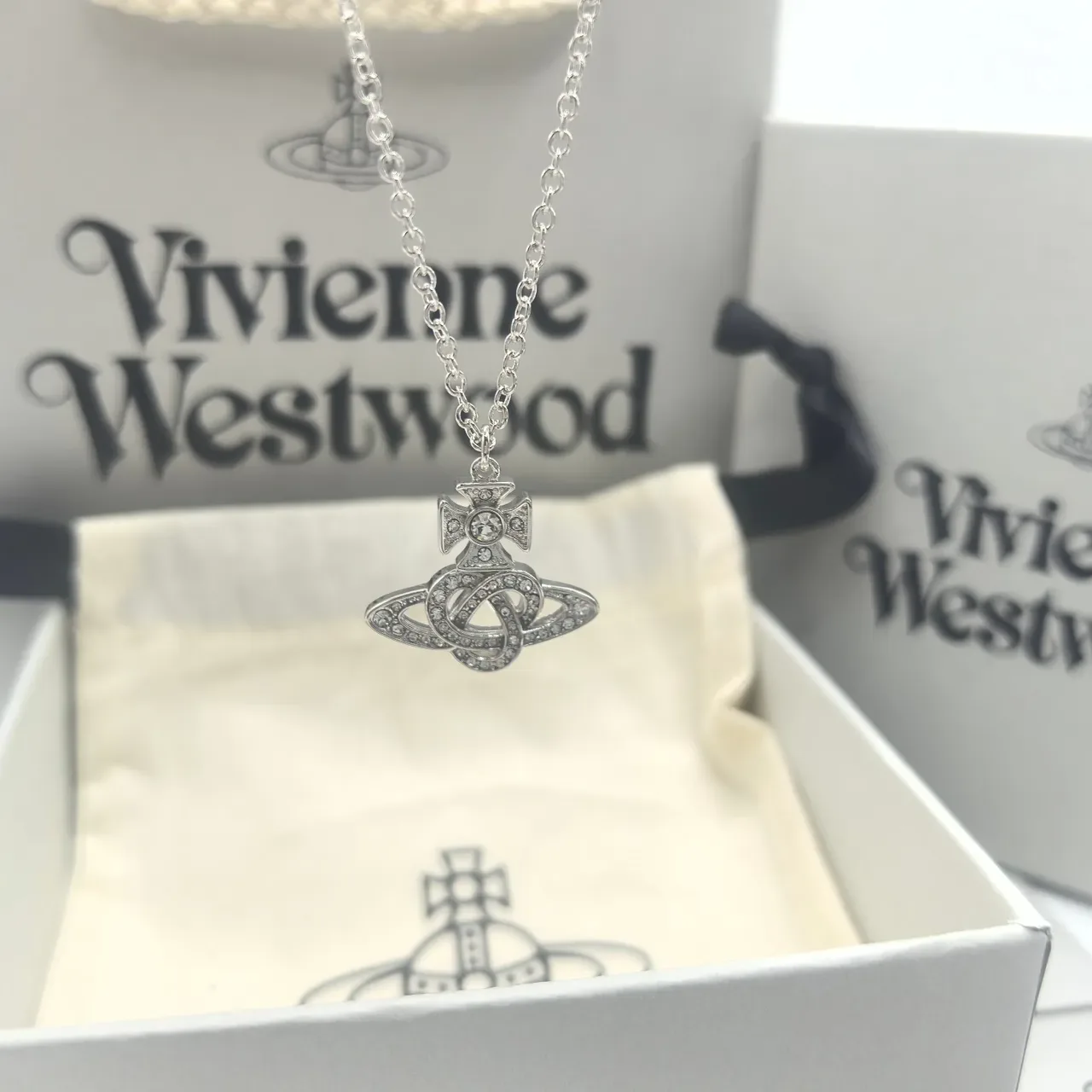Vivienne Westwood Orb Pendant Necklace Gold and Silver Crystal Necklaces 4