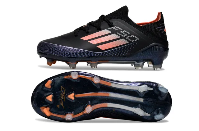 Adidas Zapatos de fútbol de corte bajo con upper sintético negro y naranja con detalles de franjas en gradiente para terreno firme 7