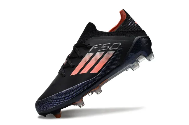 Adidas Zapatos de fútbol de corte bajo con upper sintético negro y naranja con detalles de franjas en gradiente para terreno firme 8