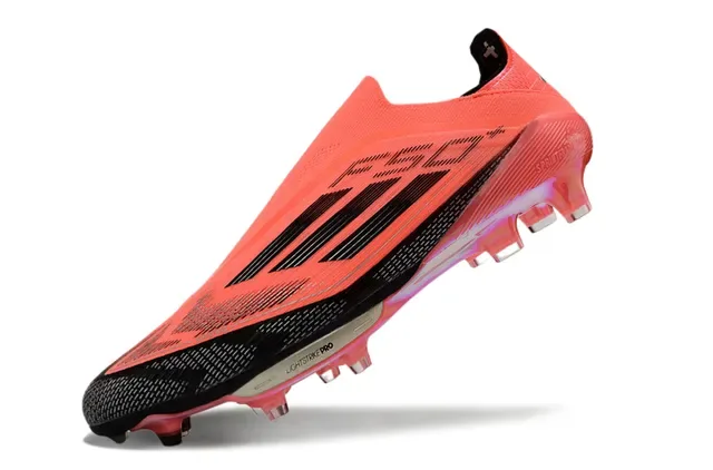 Adidas Sapatos de futebol laranja preto low-cut upper sintético cravos conicos moldados gramado firme 3