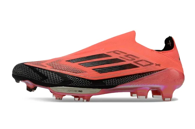 Adidas Sapatos de futebol laranja preto low-cut upper sintético cravos conicos moldados gramado firme 7