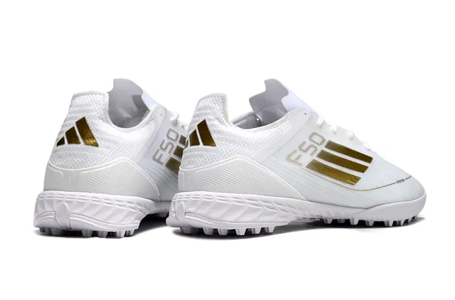 Adidas X Speedportal Chaussures de football blanches dorées pour gazon 5