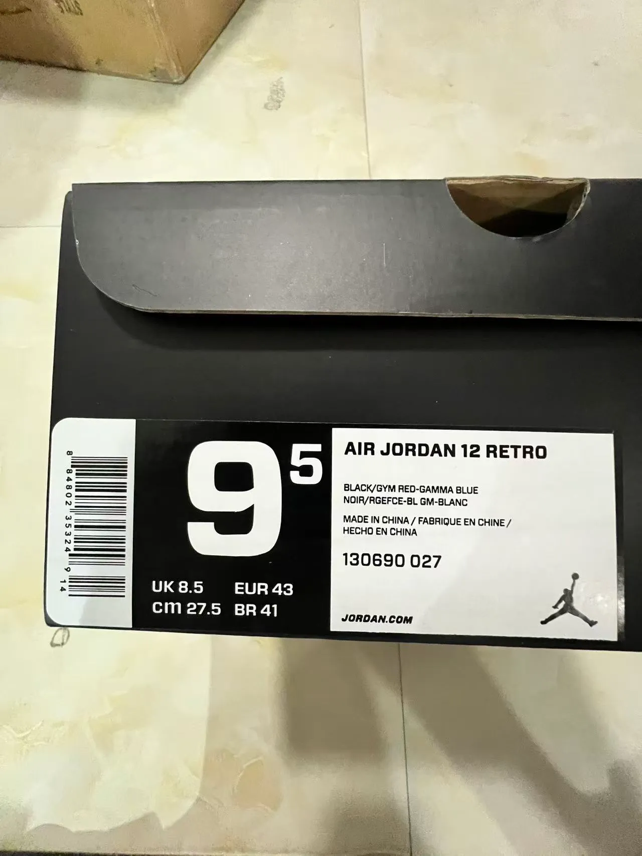 Zapatillas de baloncesto Air Jordan de caña alta en negro y azul con cuello acolchado 10
