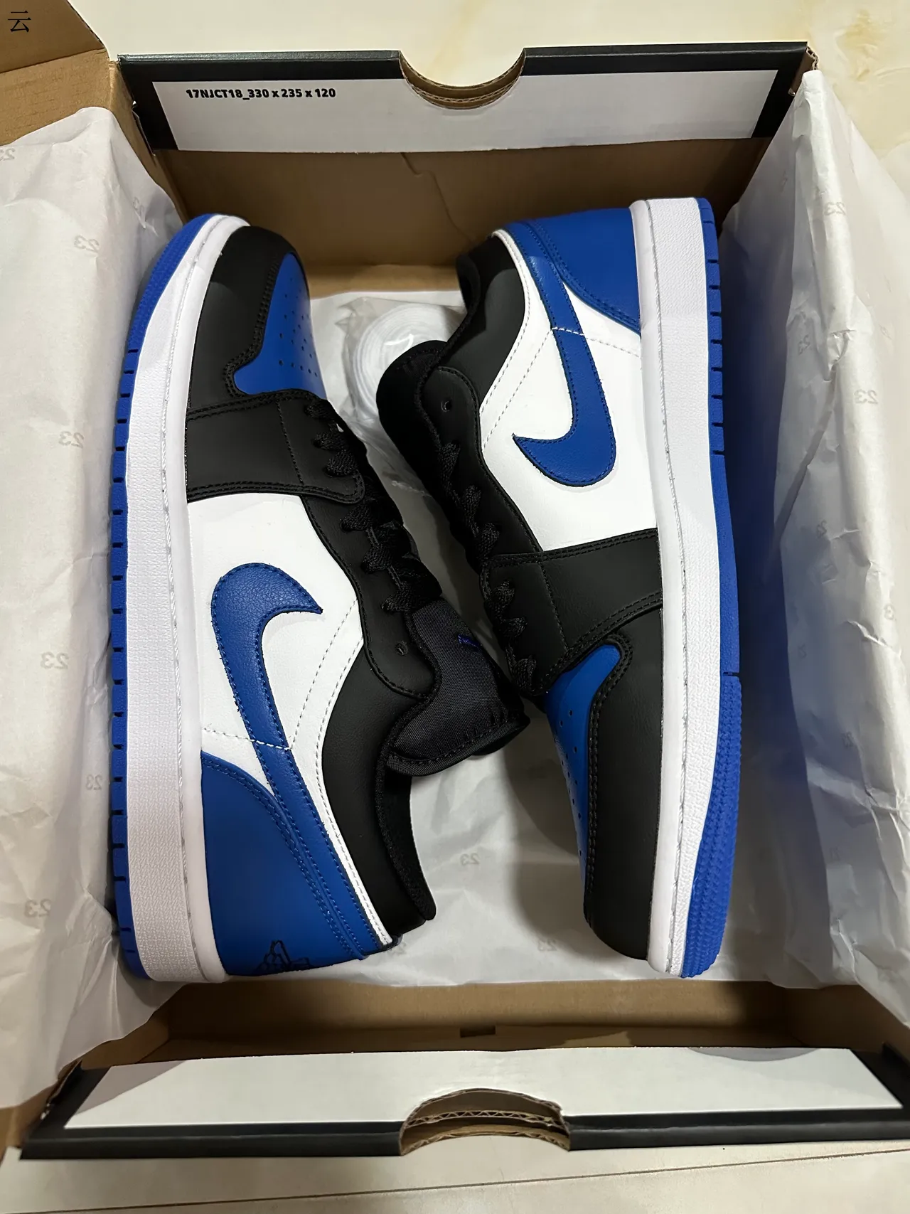 Chaussures de basketball basses à empiècements en cuir Air Jordan noir et bleu 7