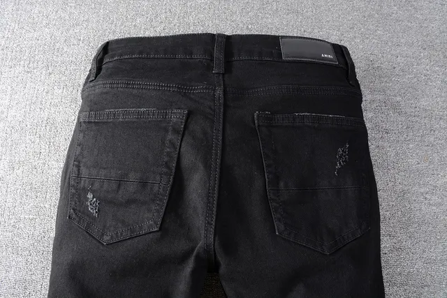 Amiri Distressed Panelled Moto Jeans 2