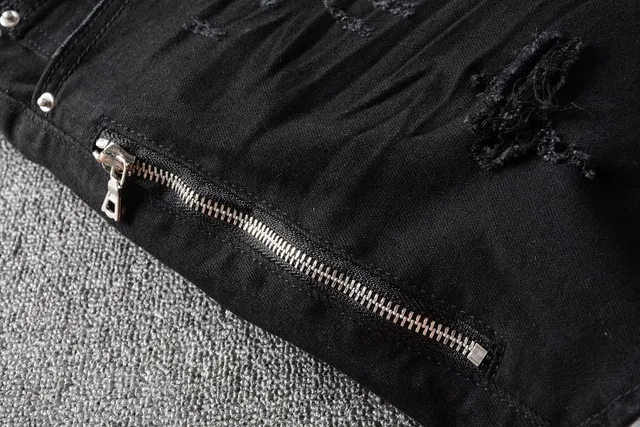 Amiri Distressed Panelled Moto Jeans 5