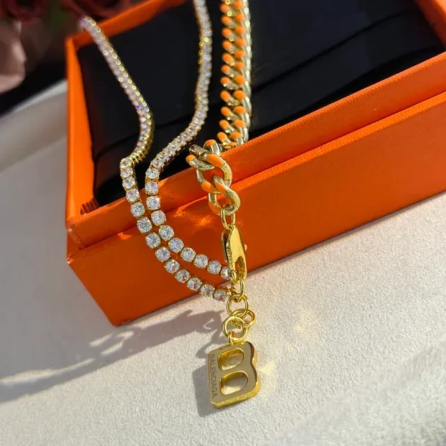 Balenciaga Collier chaîne curb or orange à double brin avec émail 2