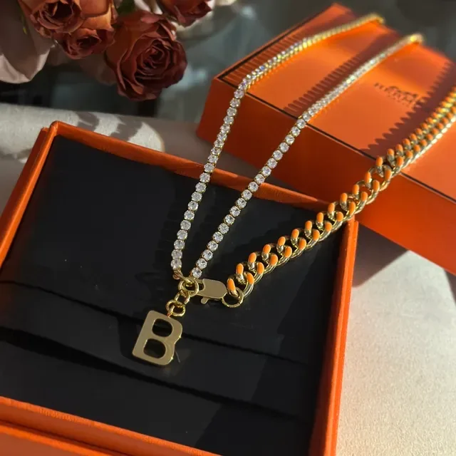 Balenciaga Collier chaîne curb or orange à double brin avec émail 6