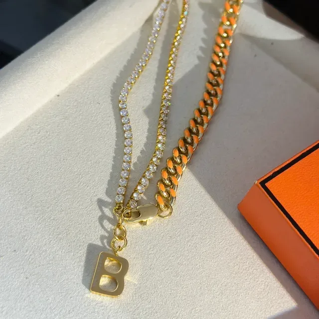 Balenciaga Collier chaîne curb or orange à double brin avec émail 7