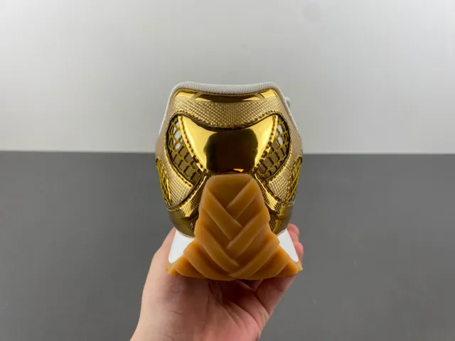 Bottega Veneta Andiamo Sneakers lifestyle en maille métallique dorée 4