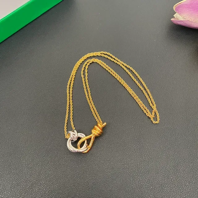 Bottega Veneta Knot Two-Tone Gold and Silver Pendant Necklace 9
