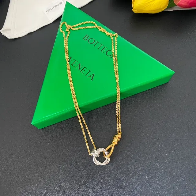 Bottega Veneta Knot Two-Tone Gold and Silver Pendant Necklace 10