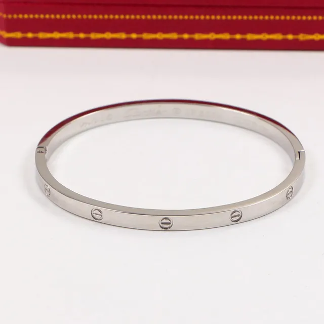 Cartier Love bracelet en or et argent motif vis profil plat 2