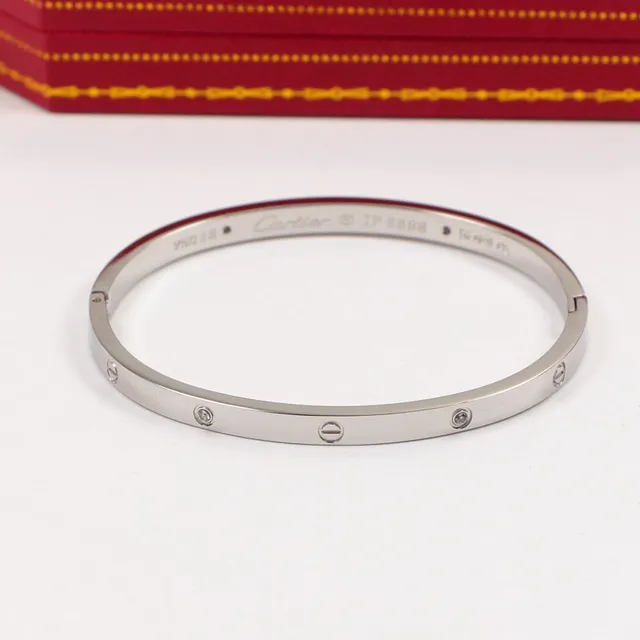 Cartier Love bracelet en or et argent motif vis profil plat 3