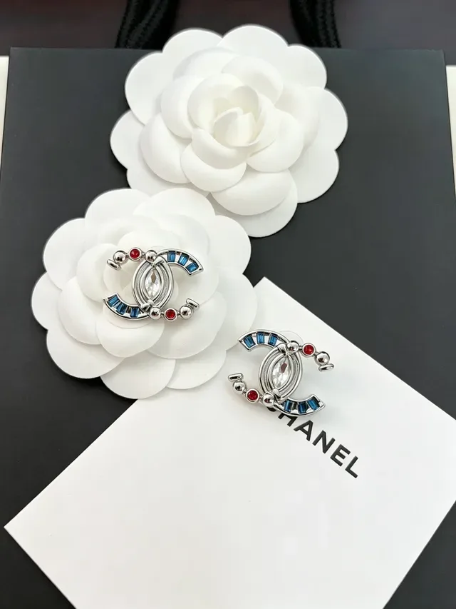 Chanel CC Silver Blue Interlocking Logo Marquise-Cut Central Crystal Earrings 8