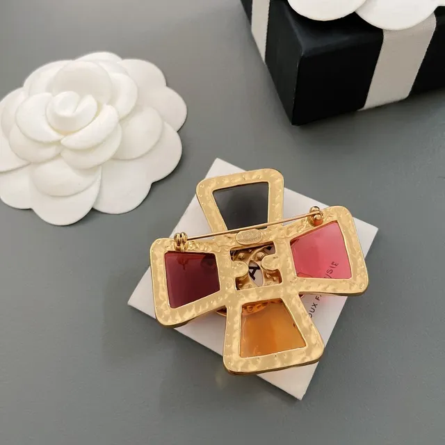Chanel Multicolor Gold Cross-Shaped Resin Brooch 4