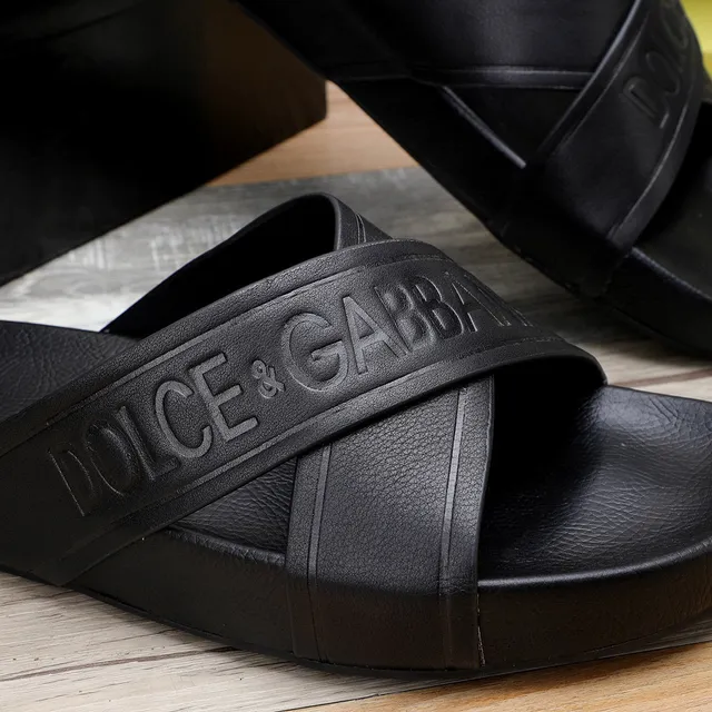 Dolce & Gabbana logo embossé cross-strap pantoufles noires 3