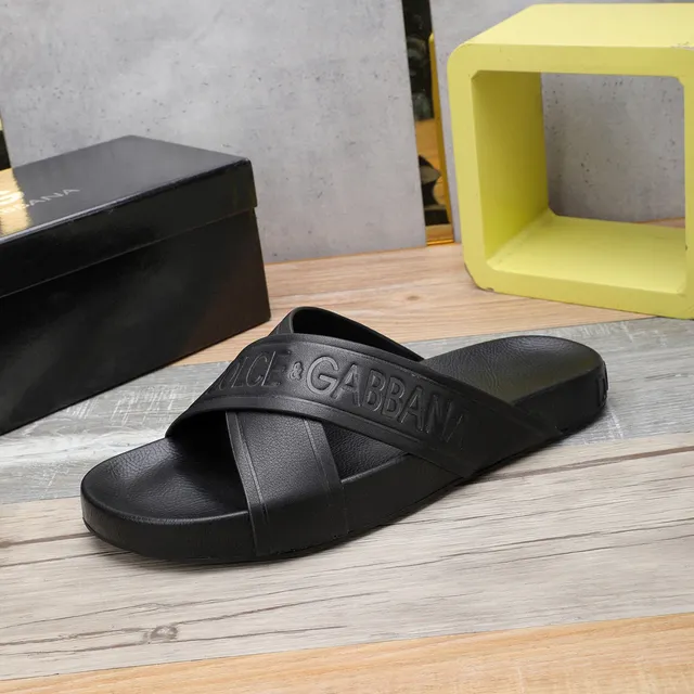 Dolce & Gabbana logo embossé cross-strap pantoufles noires 6