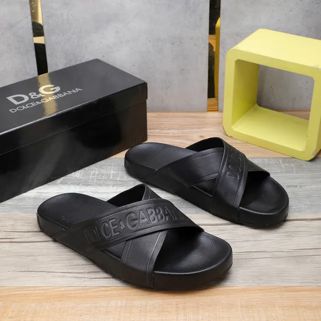 Dolce & Gabbana logo embossé cross-strap pantoufles noires 9