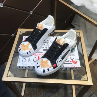 Dolce & Gabbana White Black Embroidered Lion Motif Gold Heel Tab Lifestyle Sneakers