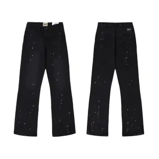 Jeans noirs avec salissures de peinture distressed flared