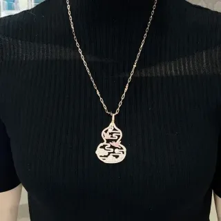 Collar con colgante en forma de calabaza negro rosa con piedras pavé