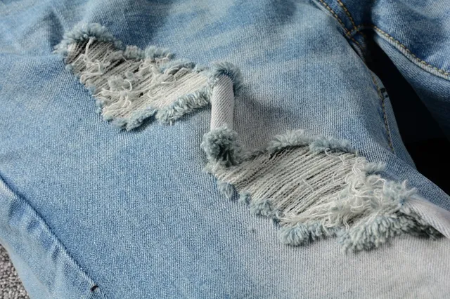 Distressed Slim-Fit Light-Wash Blue Jeans 6