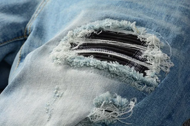 Distressed Slim-Fit Light-Wash Blue Jeans 8
