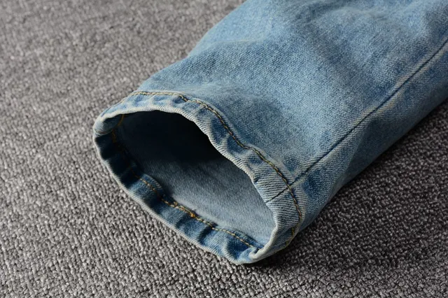 Distressed Slim-Fit Light-Wash Blue Jeans 13