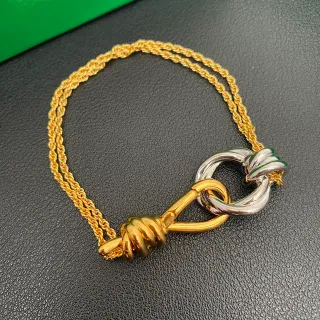 Pulseira de corrente de corda com nó retorcida de duas tonalidades em ouro e prata