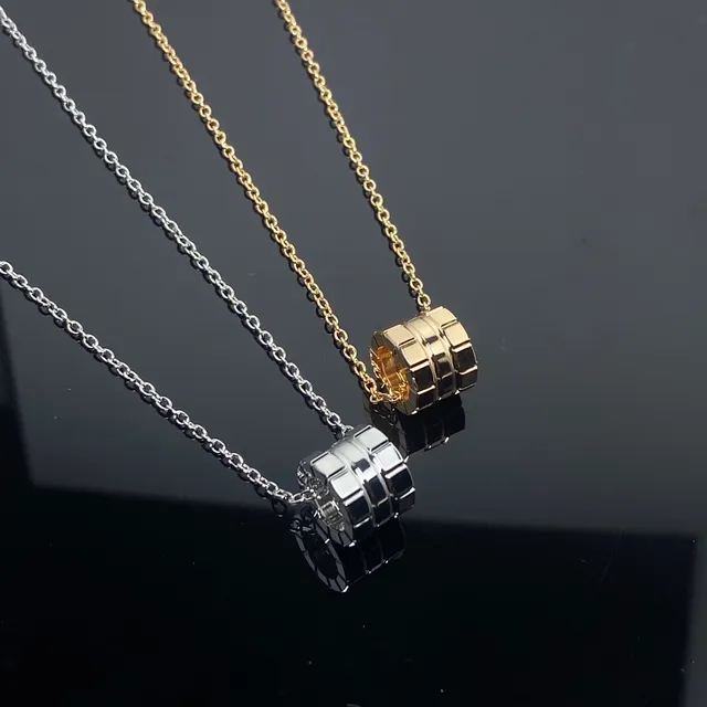 Gold and Silver Tone Segmented Cylindrical Pendant Necklaces 3