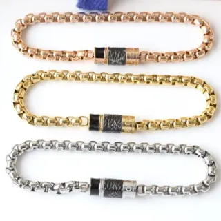 Pulsera de Cadena con Eslabones de Oro y Negro