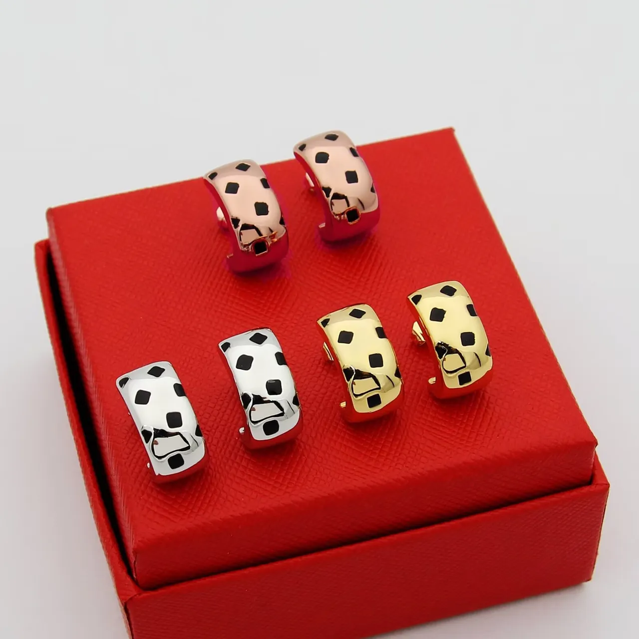 Gold Black Huggie-Style Metallic Earrings 3